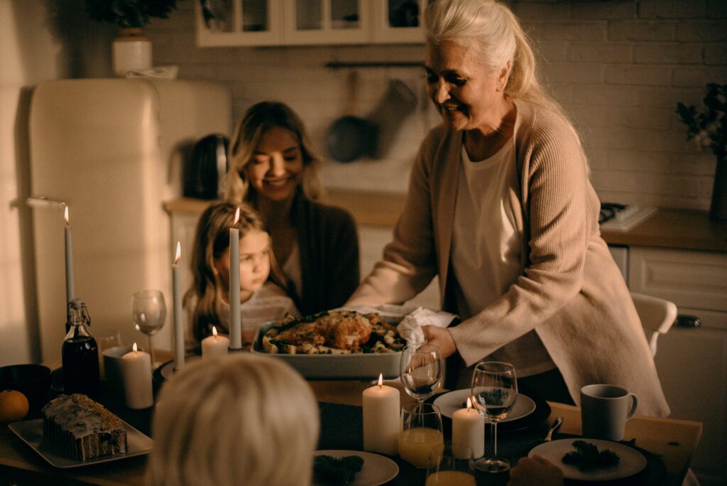 dementia care over christmas. Family Christmas dinner with elderly family members